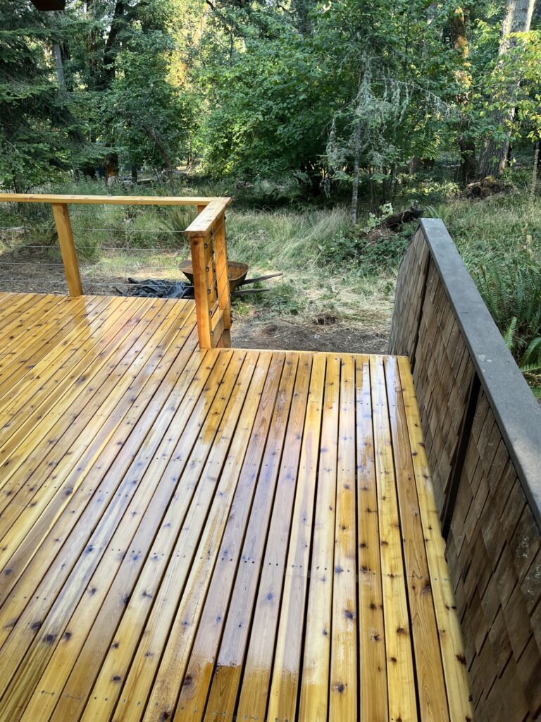 Cedar deck with new wire railing in Eugene, Oregon.