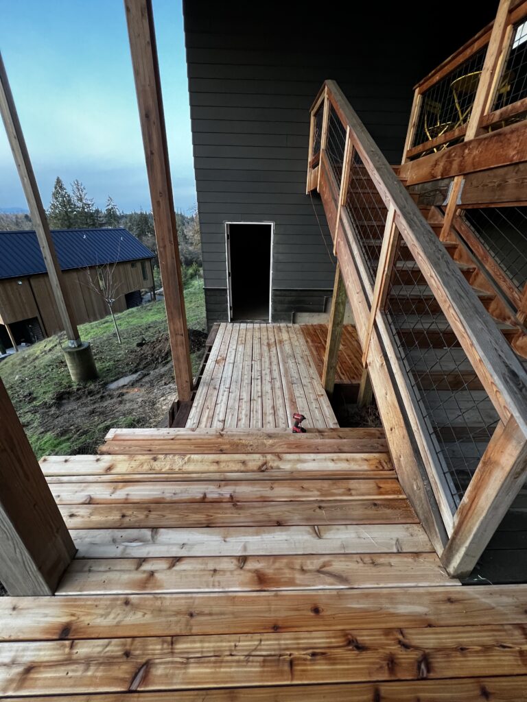 Treated cedar wood staircase and decking in Springfield, Oregon.